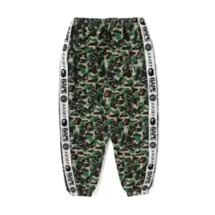 Meta Description (155–160 characters) Shop the Green BAPE x Saint Mx Camo Track Pants, featuring bold camo design, premium comfort, and modern streetwear style for a standout look. Short Description The Green BAPE x Saint Mx Camo Track Pants combine iconic camo aesthetics with modern streetwear comfort. Designed with a bold green pattern, premium fabric, and a relaxed fit, these track pants are perfect for casual outfits and urban fashion. Long Description The Green BAPE x Saint Mx Camo Track Pants are a statement piece designed for streetwear enthusiasts who value bold style, comfort, and quality craftsmanship. Featuring a distinctive green camouflage pattern, these track pants bring a fresh and stylish edge to any casual wardrobe. Crafted from high-quality materials, the pants offer a lightweight feel, durability, and all-day comfort. The relaxed fit allows easy movement while maintaining a modern streetwear silhouette. Their eye-catching camo design pairs effortlessly with hoodies, jackets, sneakers, and other urban-inspired pieces, making them a versatile addition to your collection. Designed with functionality in mind, the BAPE x Saint Mx Camo Track Pants include a comfortable waistband, practical pockets, and a durable construction built for everyday wear. Whether you're heading out, traveling, relaxing, or creating a complete streetwear outfit, these track pants deliver the perfect balance of style and performance. Key Features Premium-quality fabric for comfort and durability Bold green camouflage design Inspired by modern streetwear aesthetics Relaxed fit for everyday comfort Lightweight and breathable construction Functional pockets for daily essentials Adjustable waistband for a secure fit Durable stitching for long-lasting wear Perfect for casual outfits, travel, and streetwear styling Upgrade your streetwear collection with the Green BAPE x Saint Mx Camo Track Pants — a perfect blend of bold design, premium comfort, and modern urban fashion.